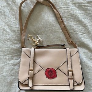 A Harry Potter envelope shaped bag. Designer-from the Warner Bros Studio site